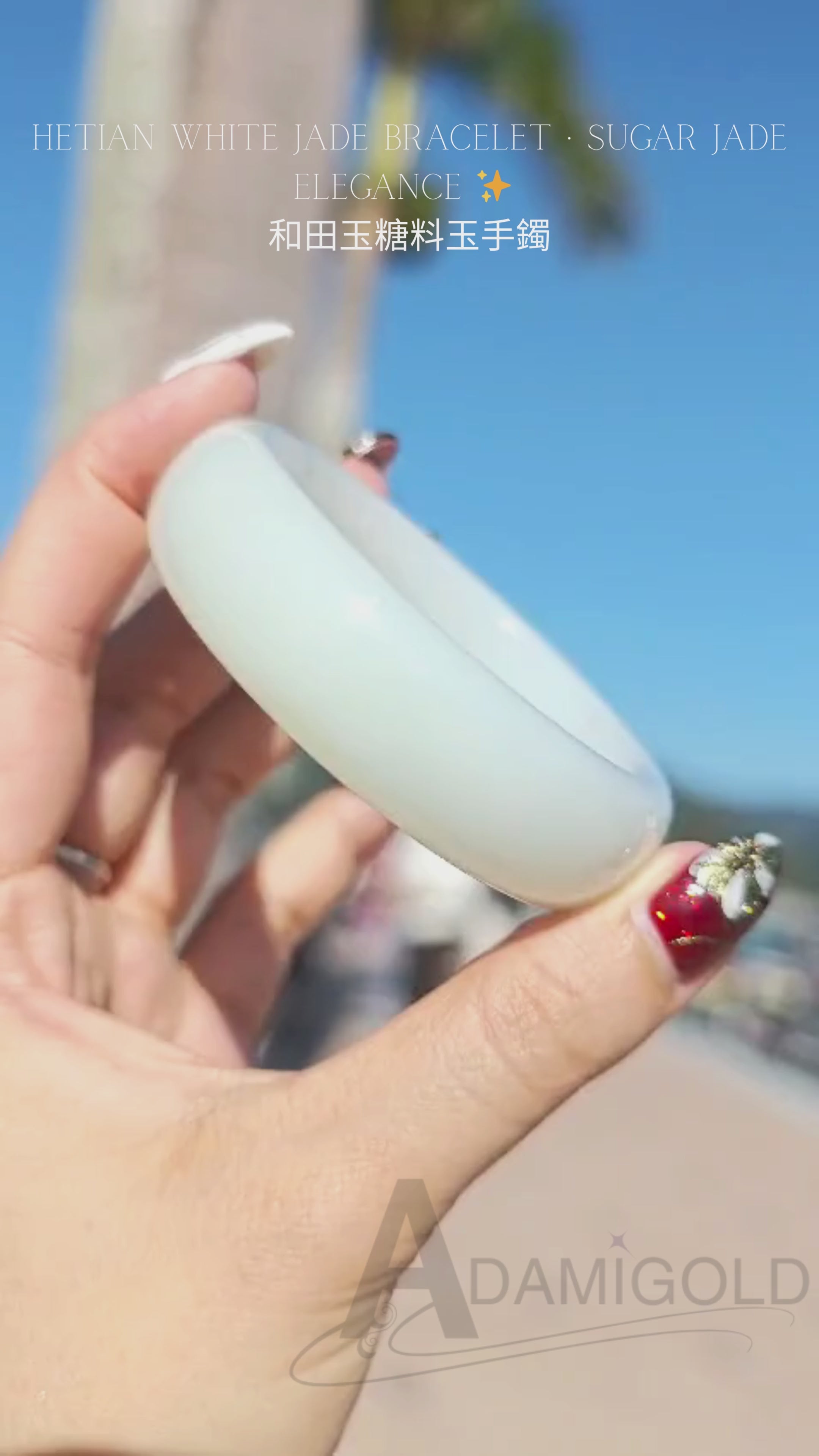 Certificate-certified Hetian white jade bangle with sugar-like inclusions | 56 mm in diameter, 18.4 mm thick.